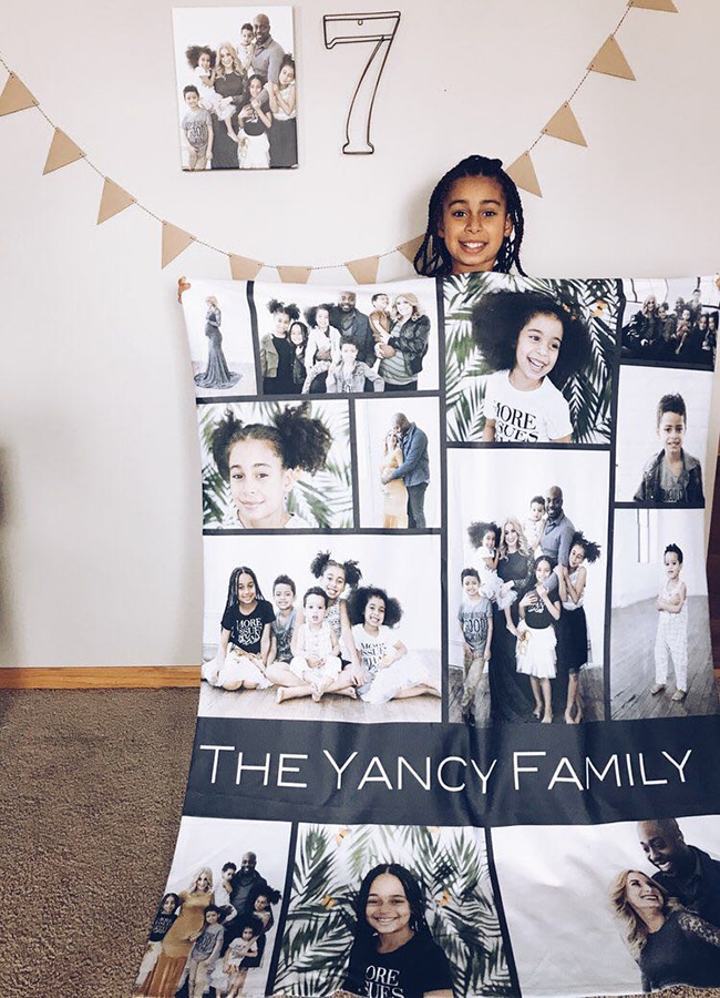 Girl holding a customised Photo Blanket