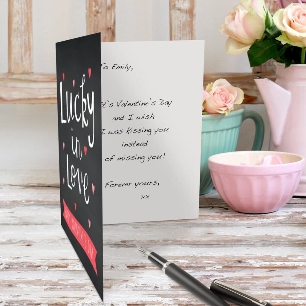 Handwritten Valentine's Day message in a card on a table