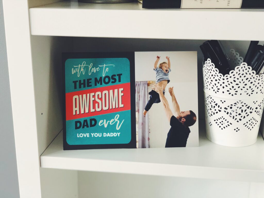 "Most Awesome Dad Ever" card on shelf