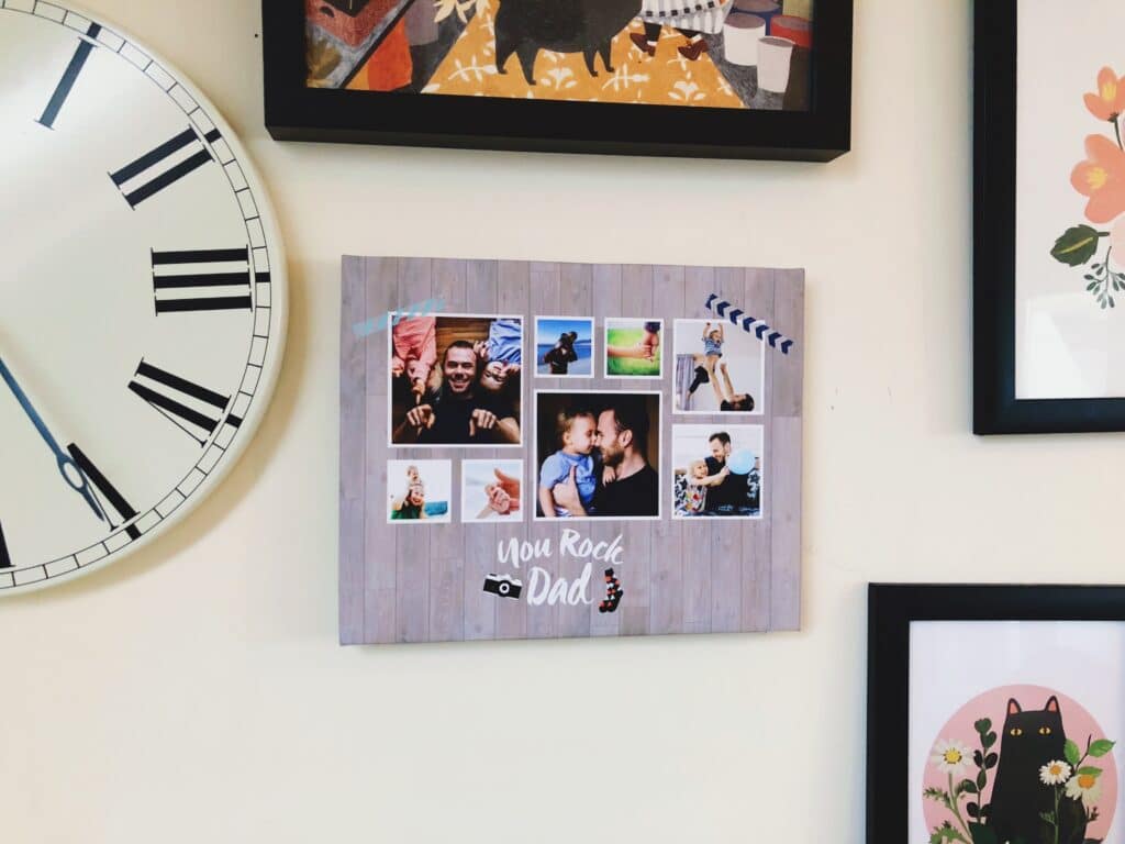 Father's Day-themed canvas and clock on wall