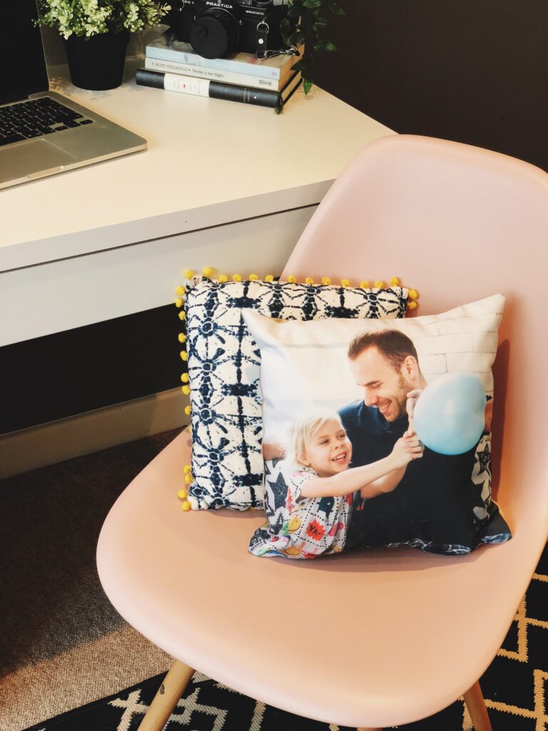 Photo pillows on chair