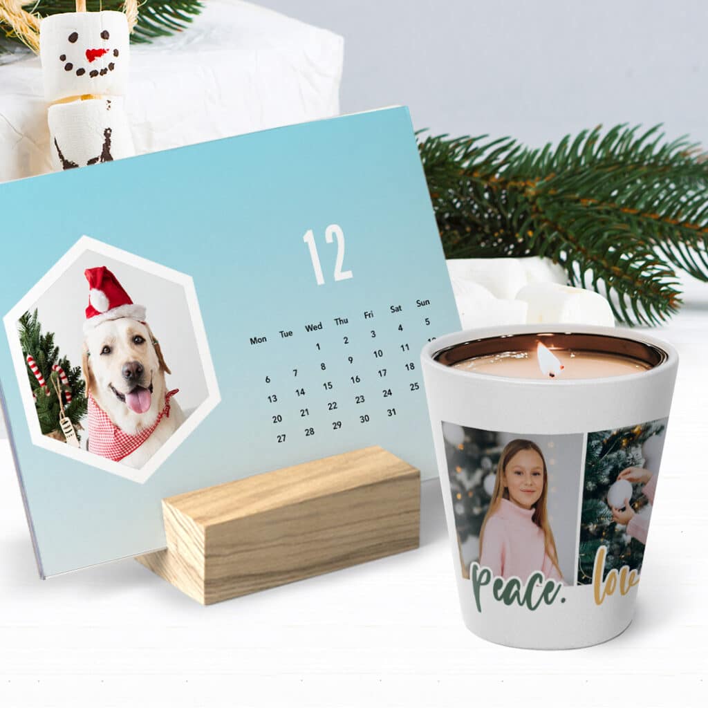 a light blue wood block calendar and a plant pot with a candle inside