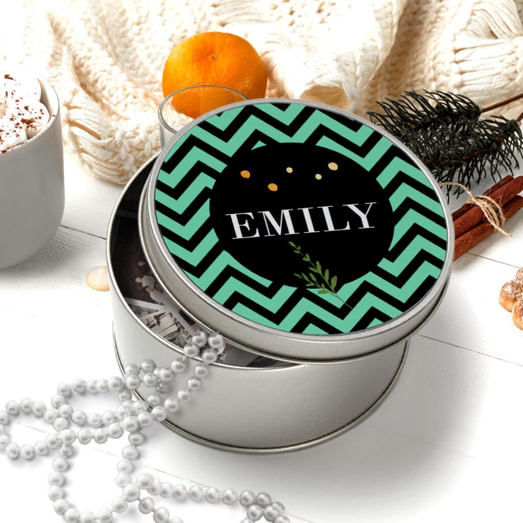 a personalised round tin with pearl necklace in it