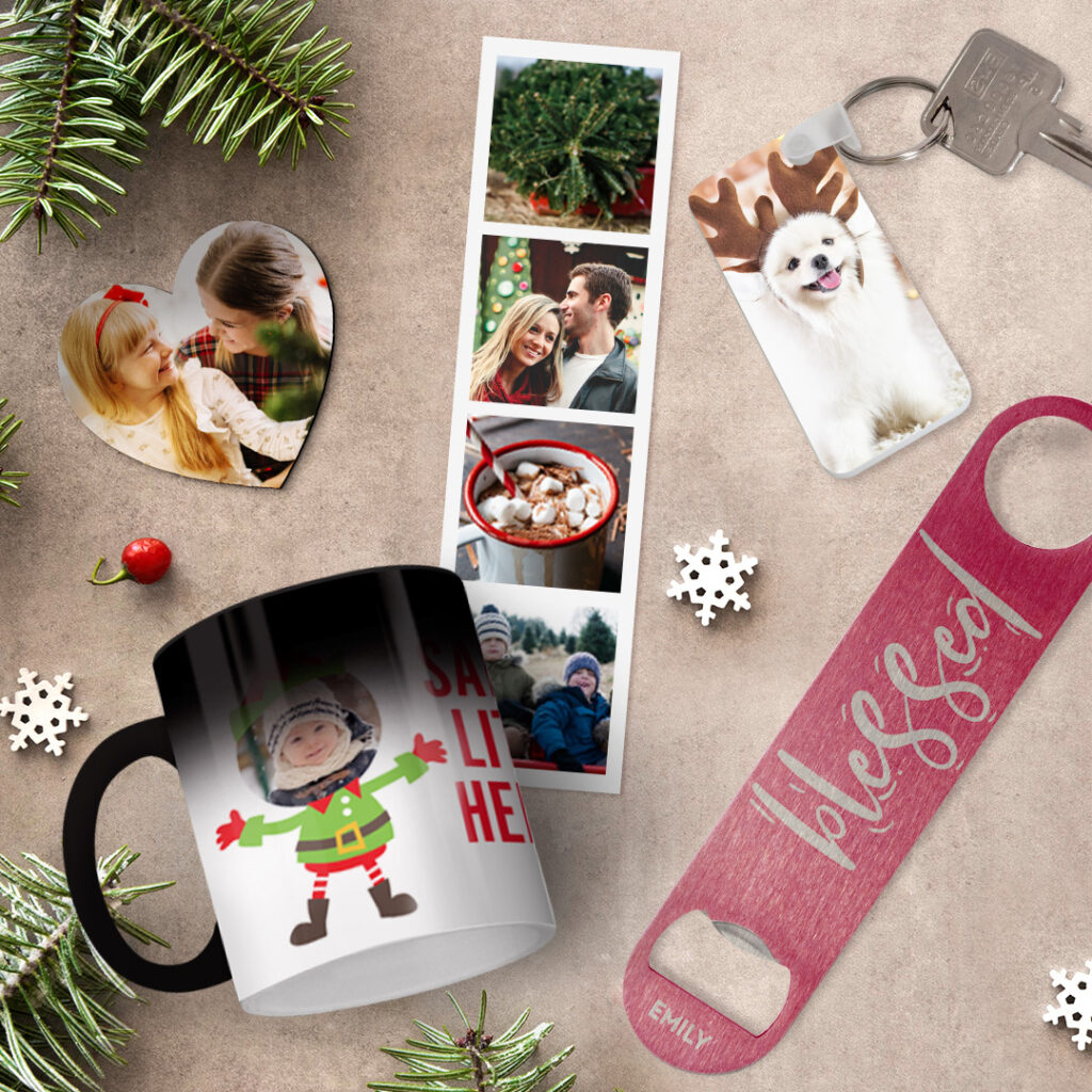 A selection of personalised Christmas gifts: a bottle opener, a magic mug, a heart magnet, magnetic photo booth strips and a rectangular key ring