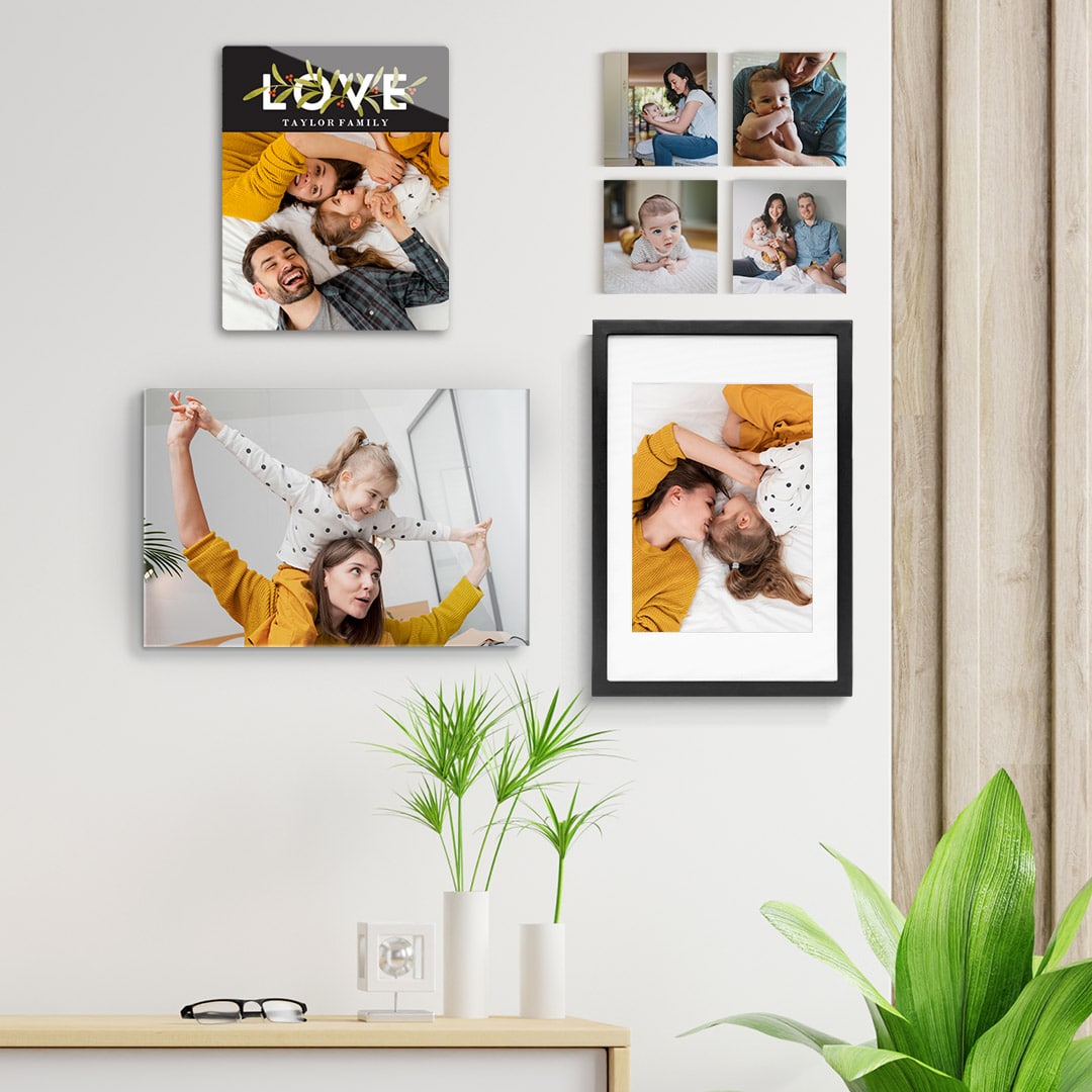 wall art selection with photos of a lovely young family