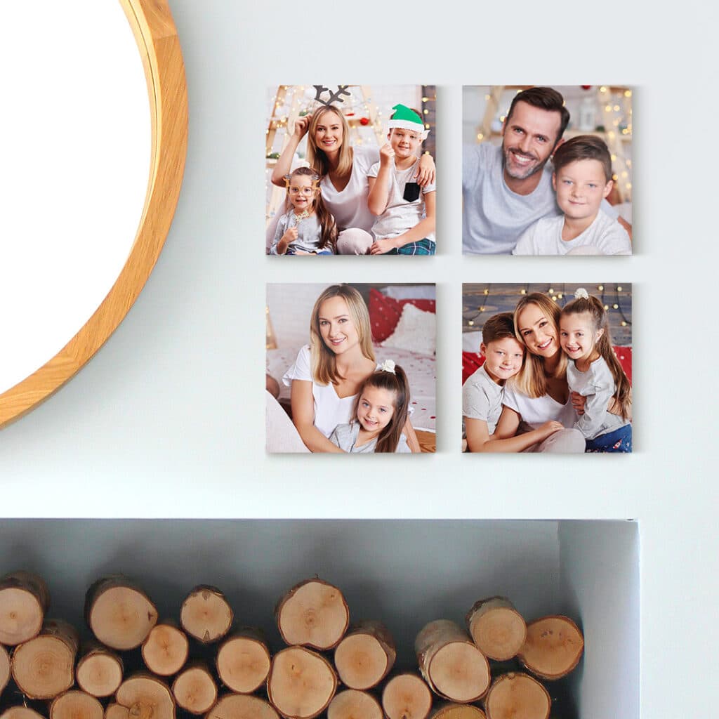 a set of photo tiles with images of a young family, presented above a fire place