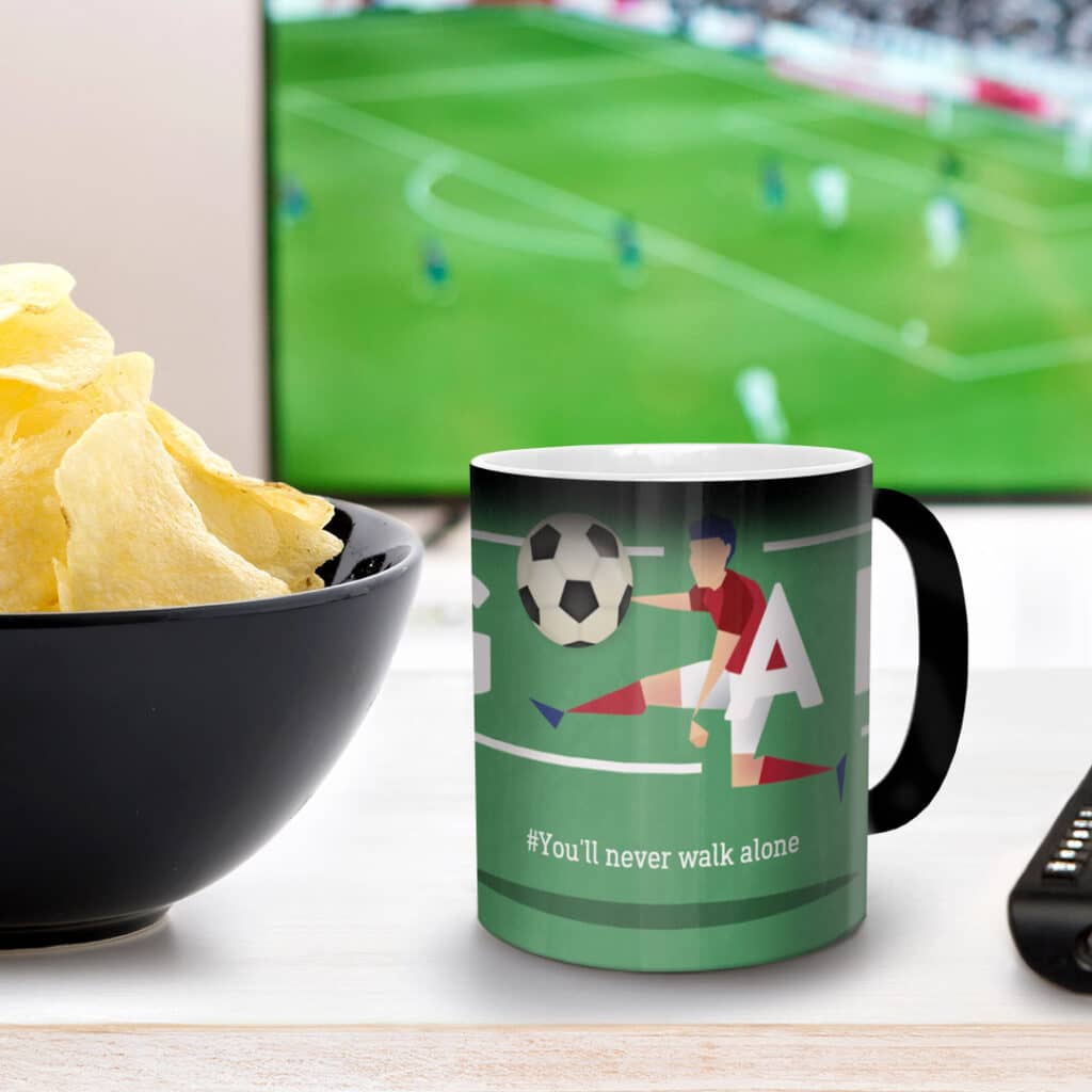 a magic mug with football image and a #you'll never walk alone slogan written on it