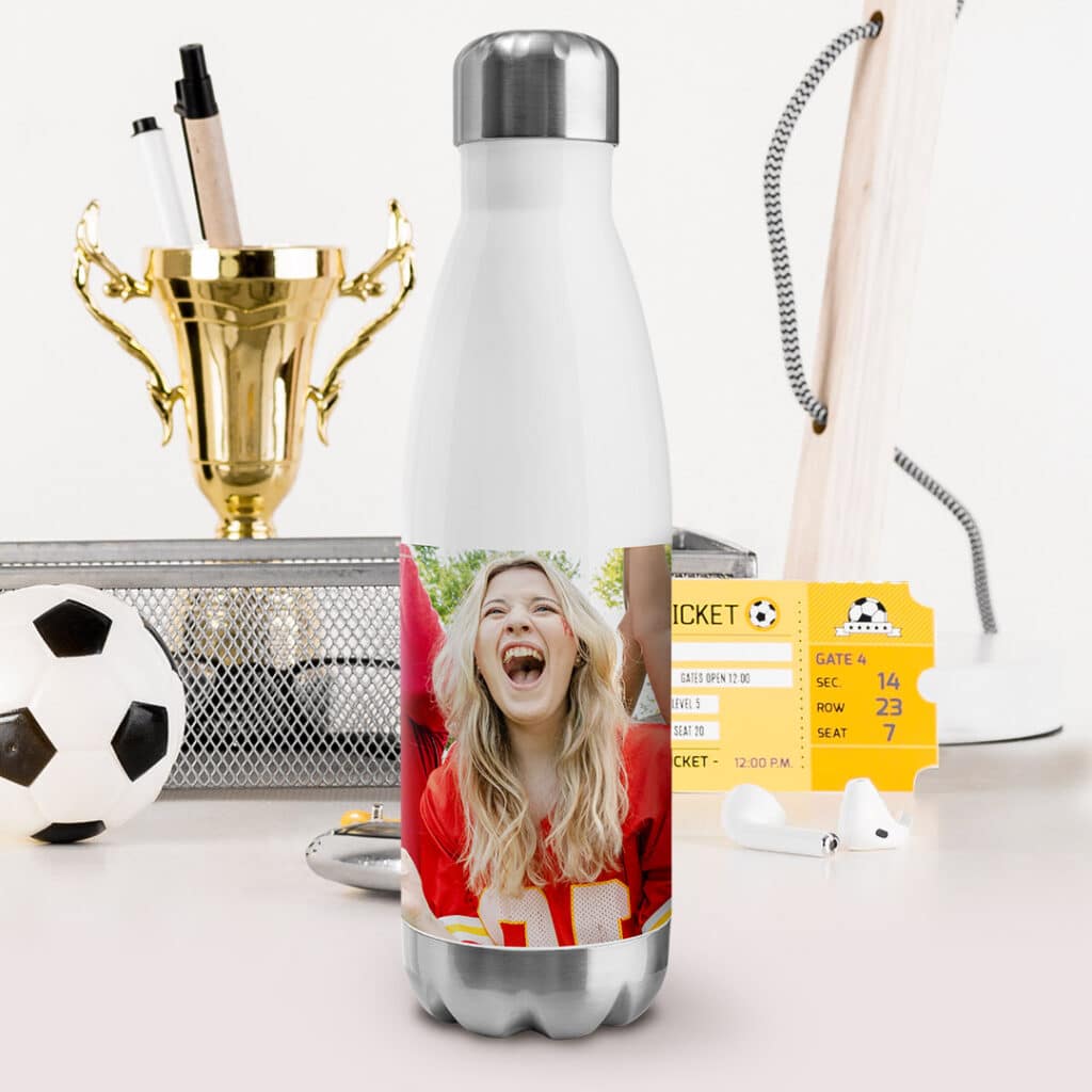 a water bottle with a photo of a football fan cheering girl