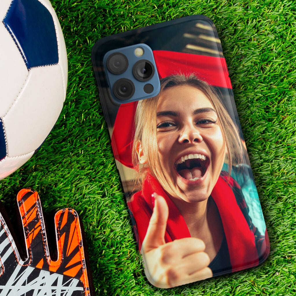 a phone case with a photo of a football fan cheering girl printed on