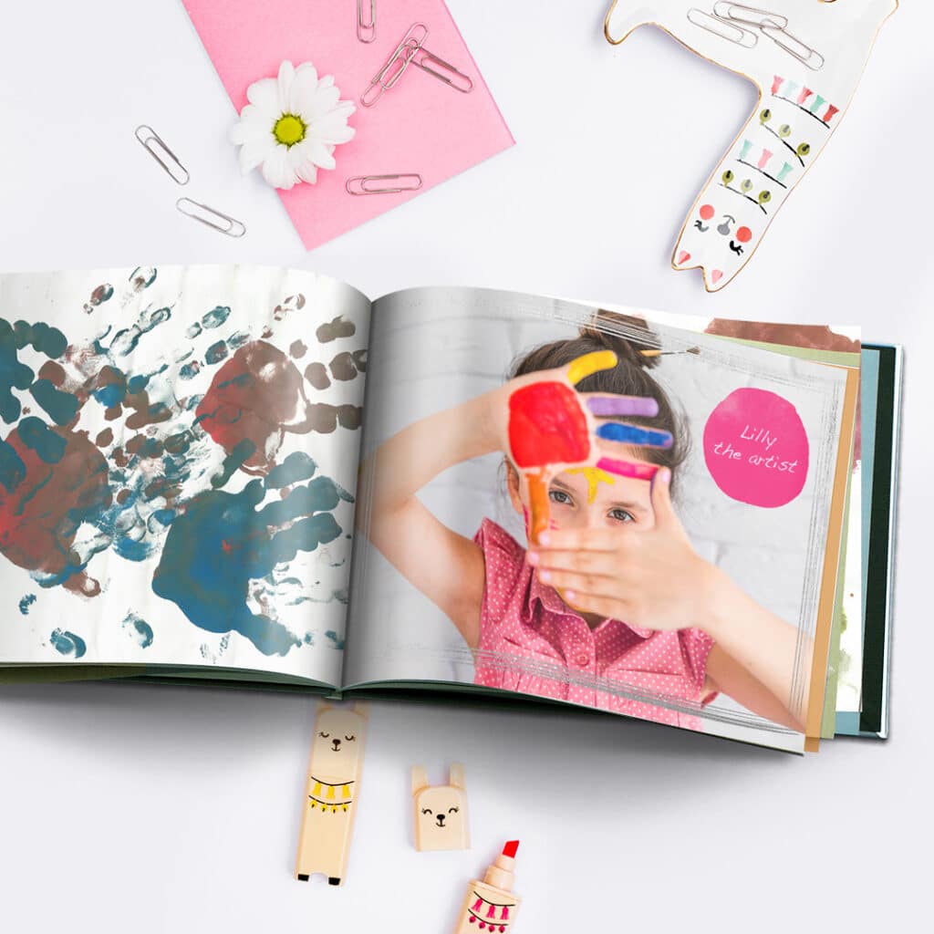 Save kids art and make a photo book with pictures of their masterpieces
