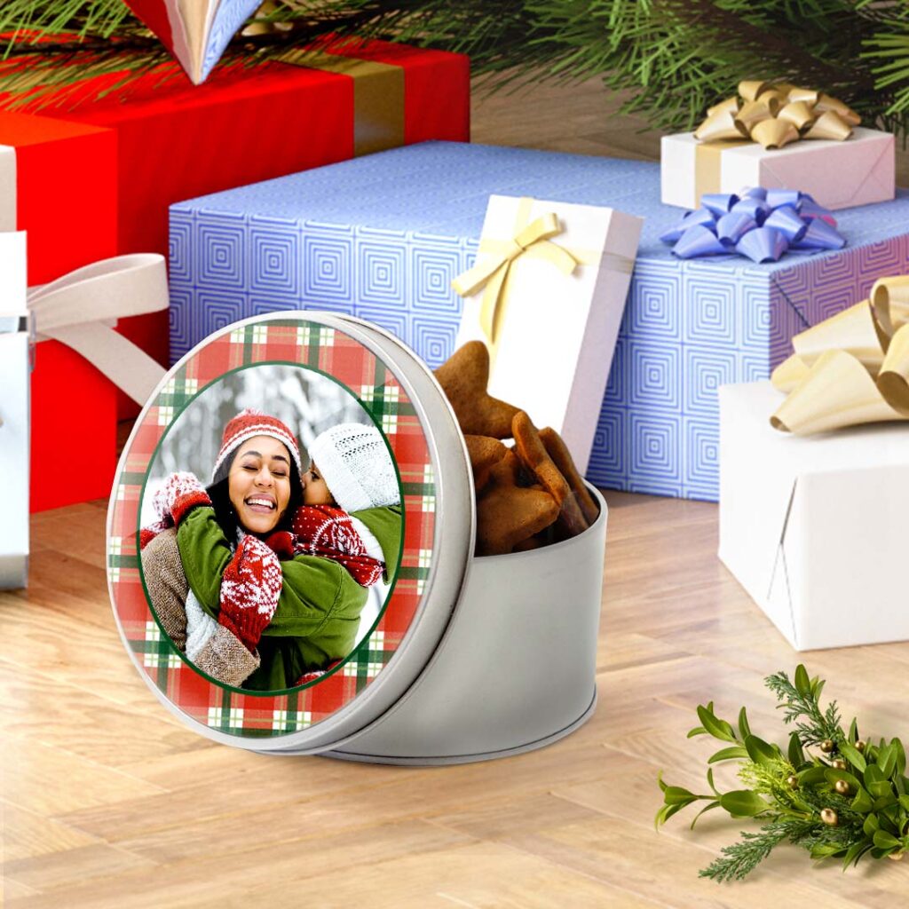 Metal keepsake tins printed with favourite pictures on the lid make ideal Xmas gifts. Make with Snapfish