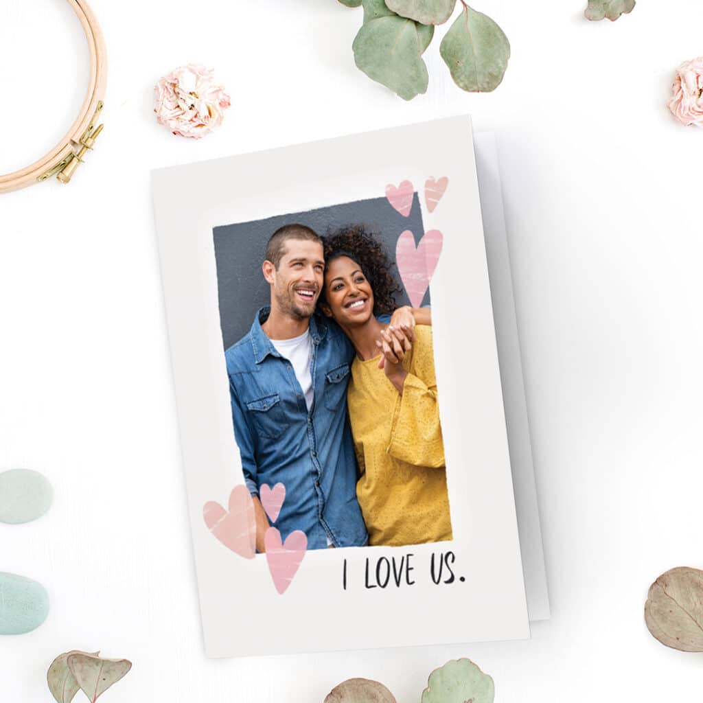 'I love us' Valentine's day card design with a photo of a lovely couple holding hands