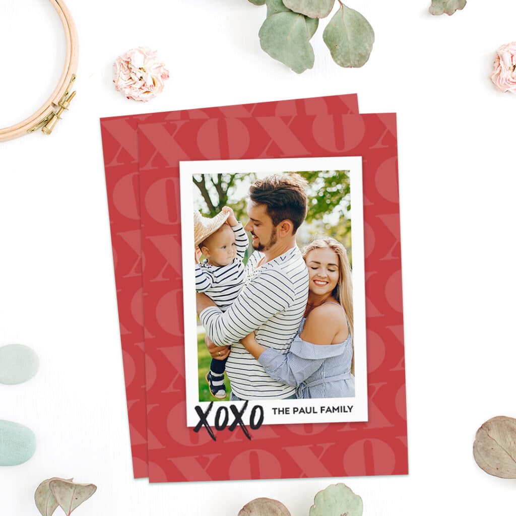Two red, flat love cards with a photo of a happy family
