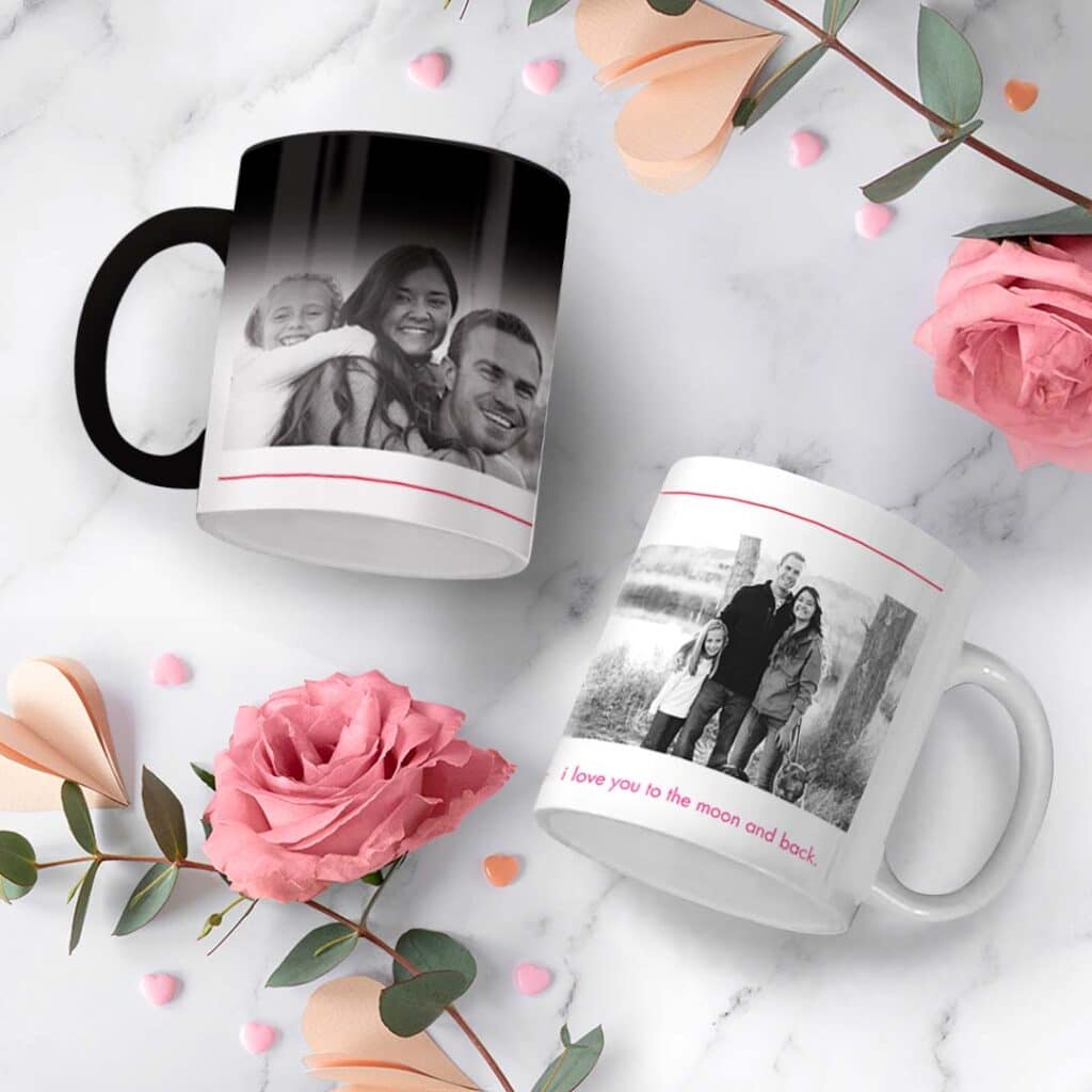 magic and regular mug on marble top printed with Valentine's Day designs