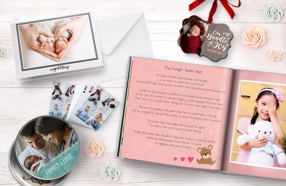 Customise a wide range of new baby gifts like keepsake tins, congratulations cards, photobooks and cards with photos and text.
