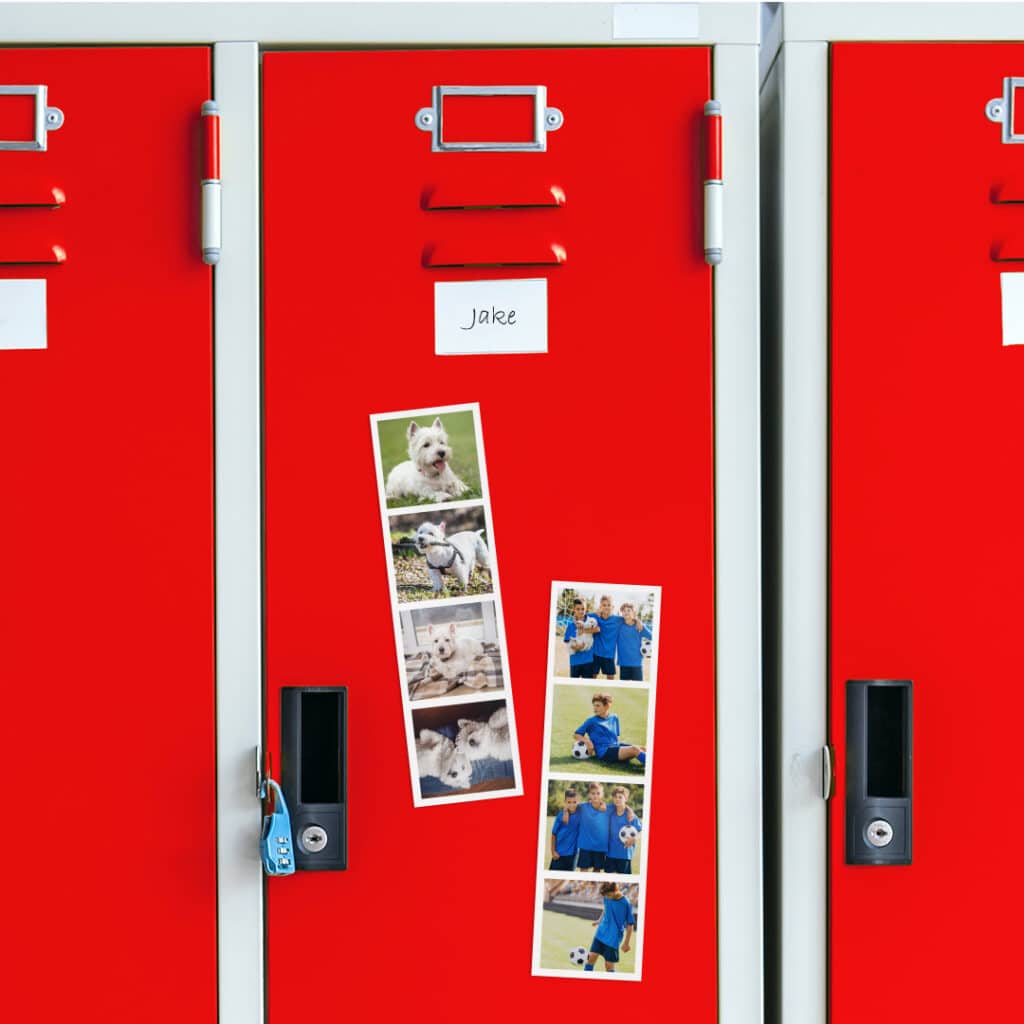 two magnetic photo booth strips on a red locker