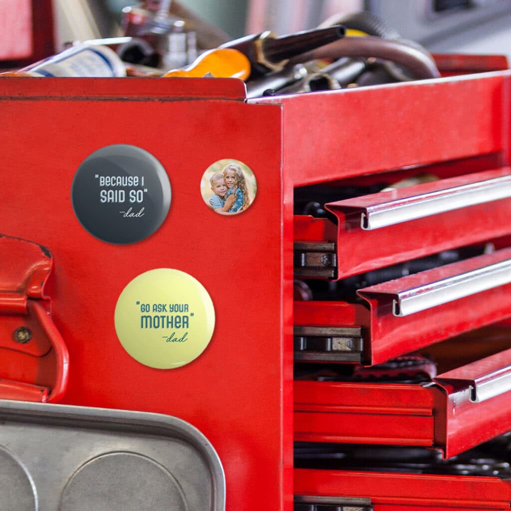 3 button badge on a mechanic's trolley
