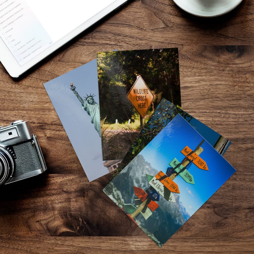 Photo prints on a wood table