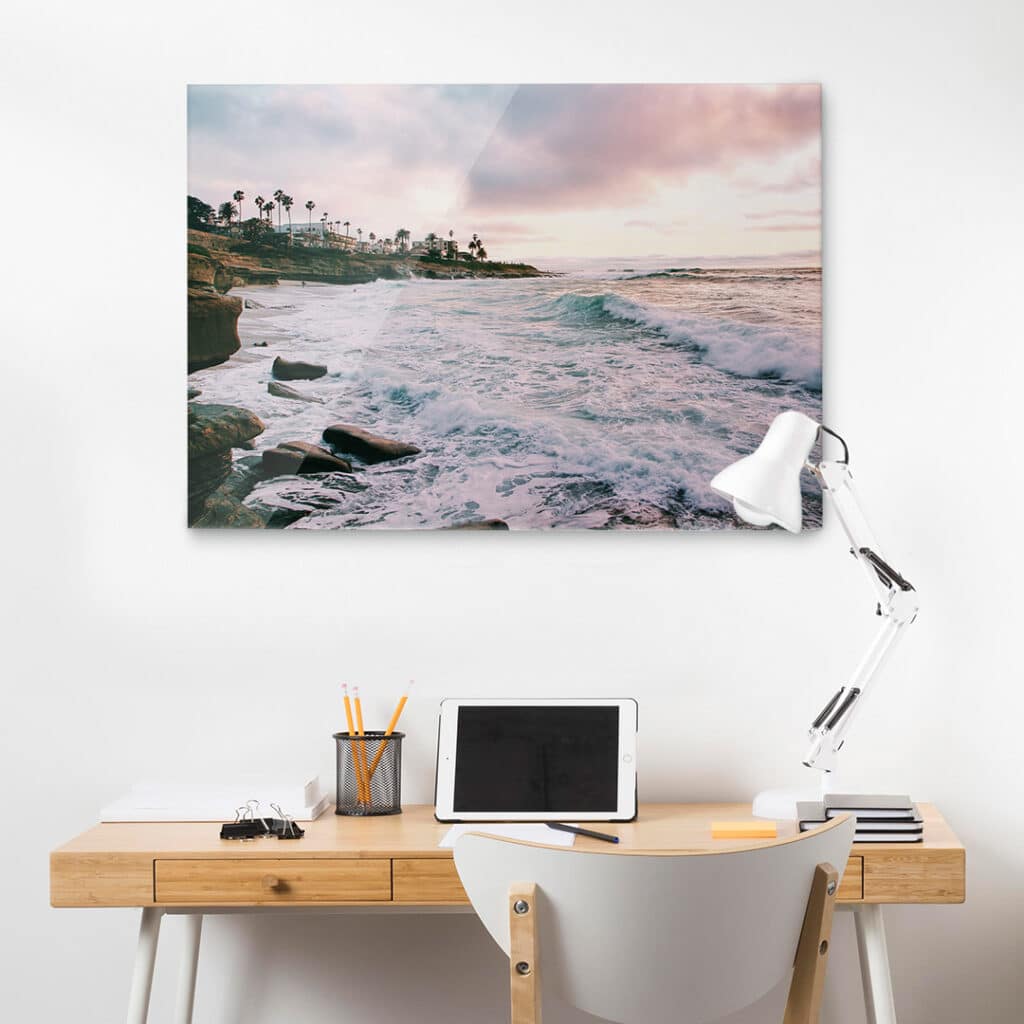 Large landscape print over a desk