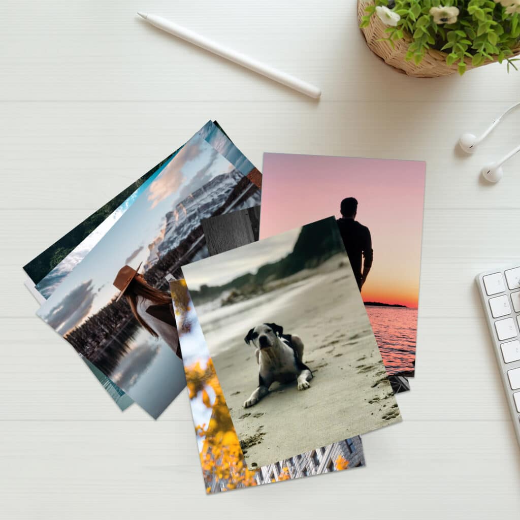 Assorted photo prints on a desk