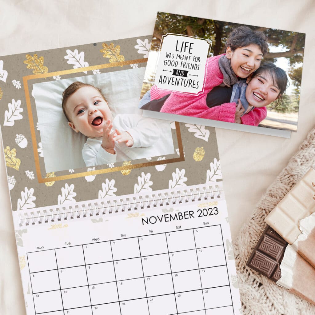 Wall calender and a greeting card displayed on a desk