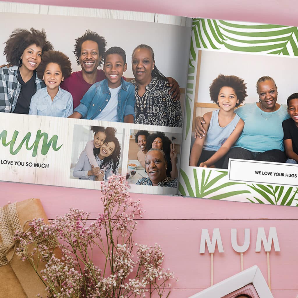 A beautiful photo book displayed with flowers and MUM lettering