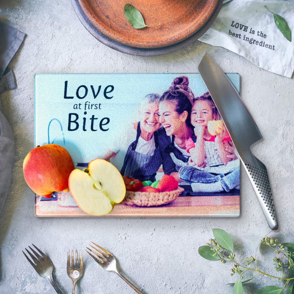 Chopping board with a knife and apple